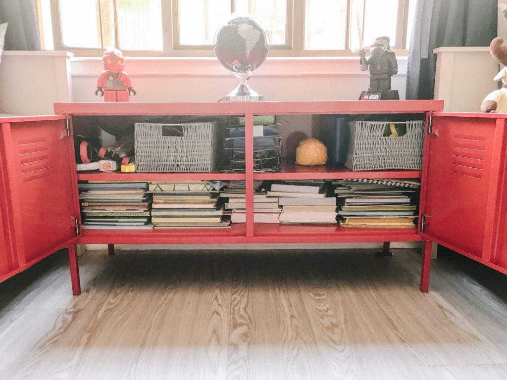 Red IKEA cabinet in boys' bedroom