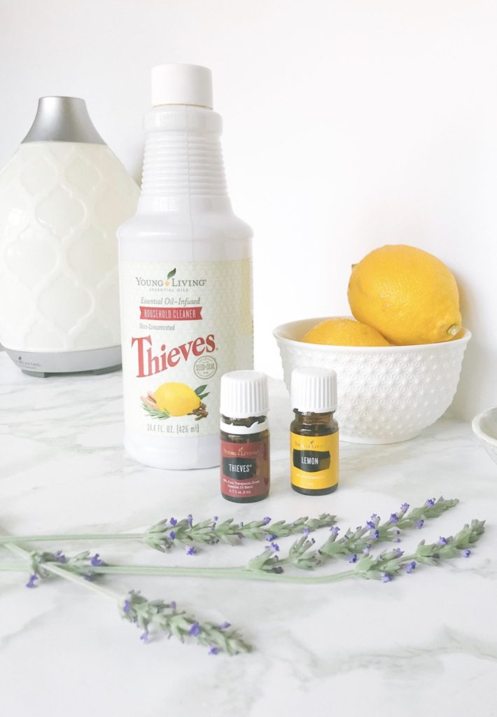 Thieves cleaner for natural cleaning along with Lemon and Thieves essential oils