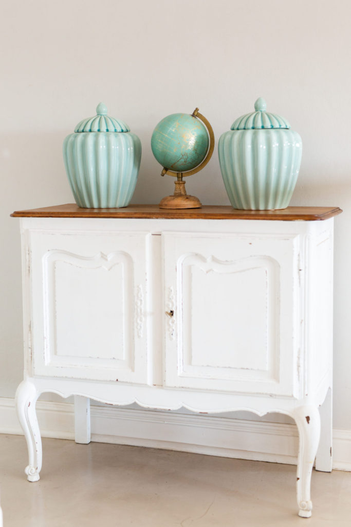 French side table with duck egg ginger jars and globe