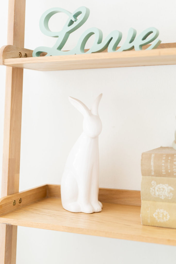 Master bedroom bookcase with ceramic bunny