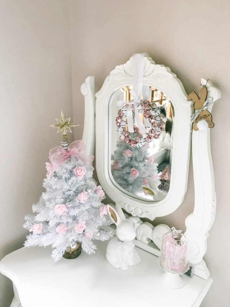 Christmas decorations on a dresser for a girl's bedroom