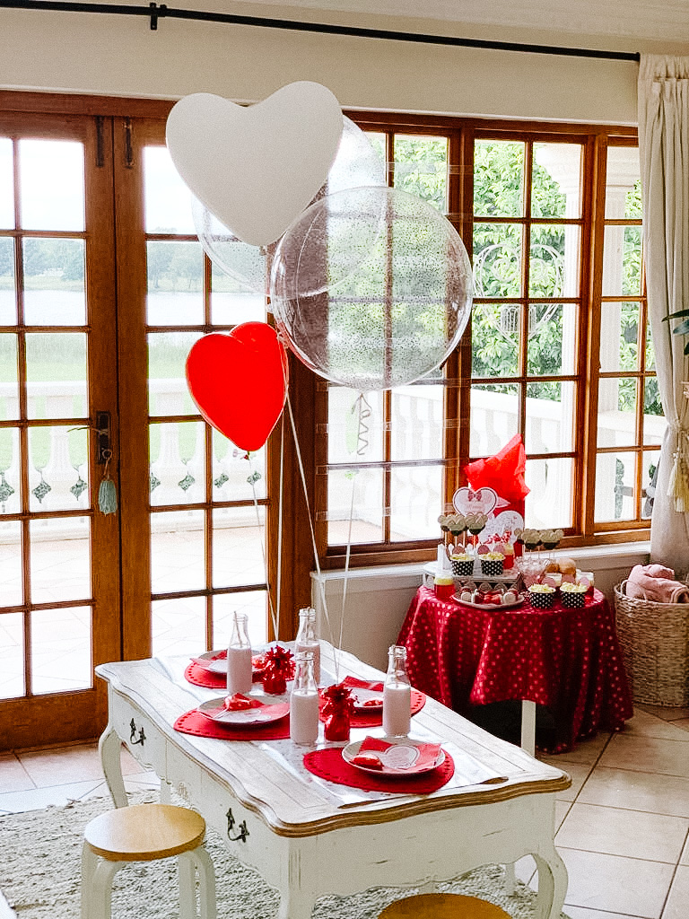Kids Mickey and Minnie Mouse Valentine's party table setting