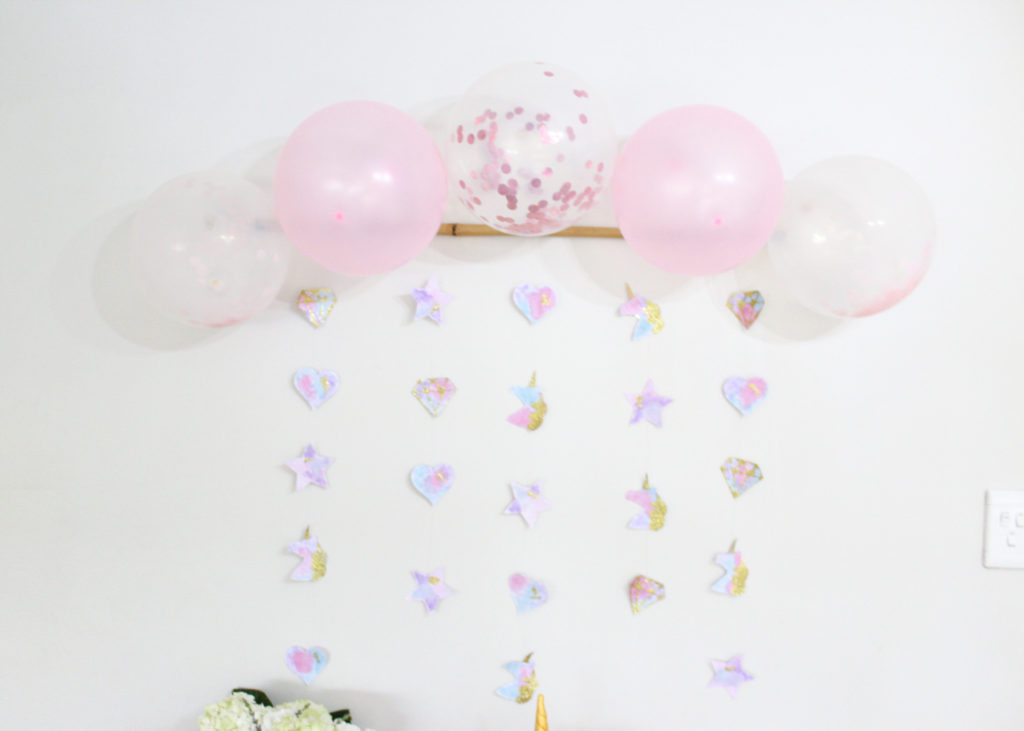 DIY Dessert table backdrop for a unicorn birthday party